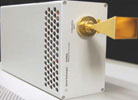 Figure 4. Agilent millimetre-frequency ultra wideband down-converter. The waveguide input with a horn antenna is at the upper right. This down-converter is driven by an external microwave LO and its output is fed to an external digitiser such as an oscilloscope
